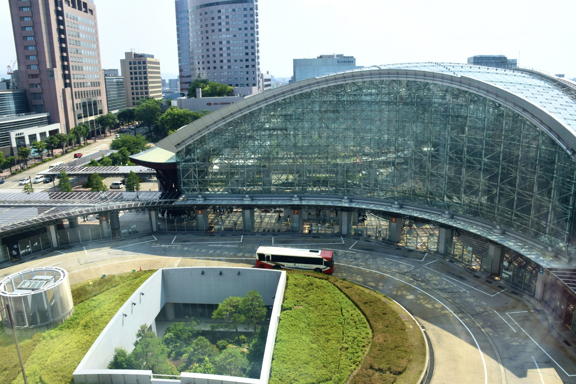 Kanazawa Station exterior with glass canopy and bus terminal